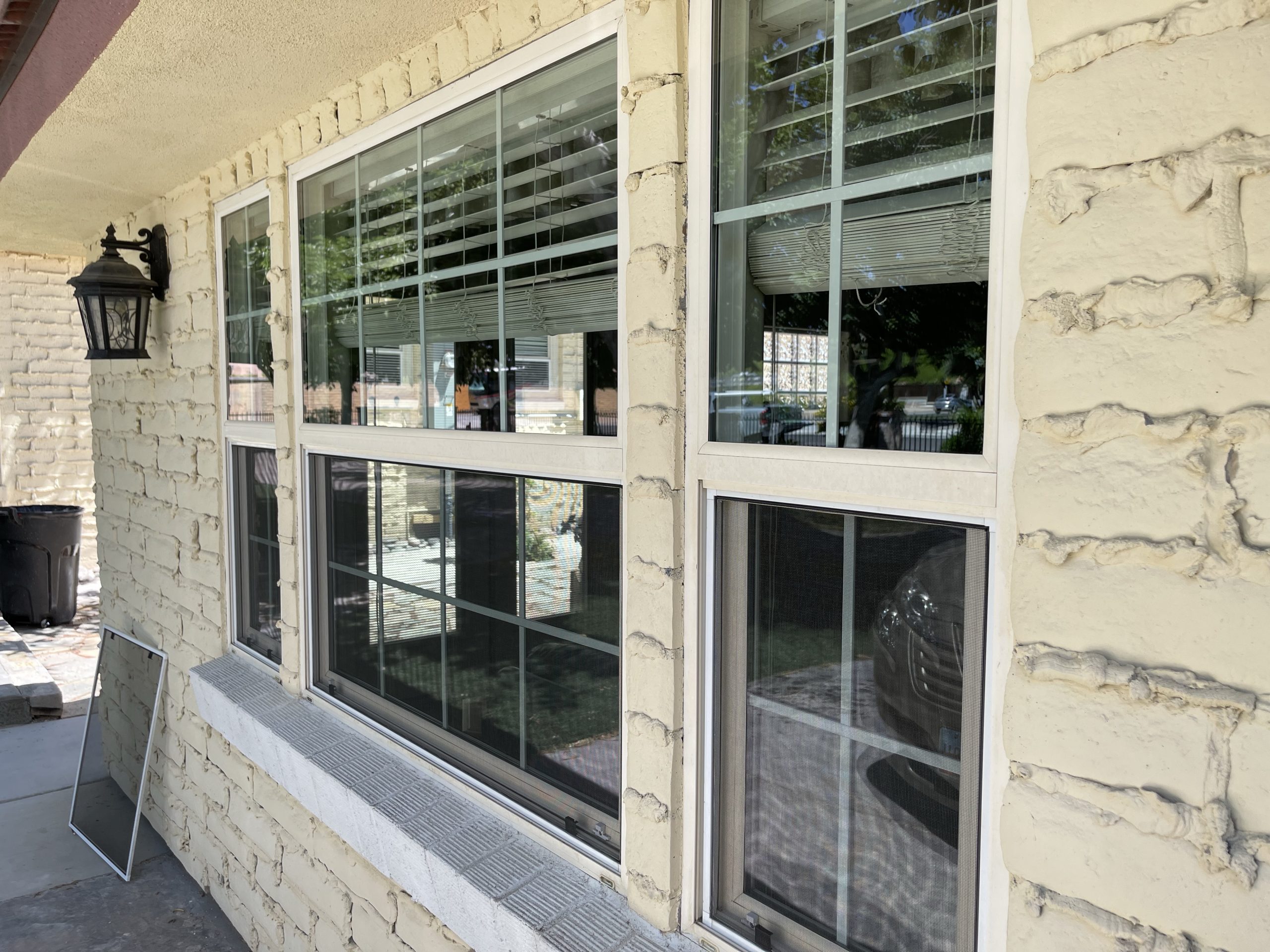 Custom window screen installation on a Centennial Hills home