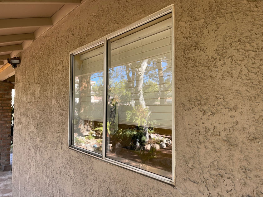 Restored window after professional hard water stain removal in Las Vegas