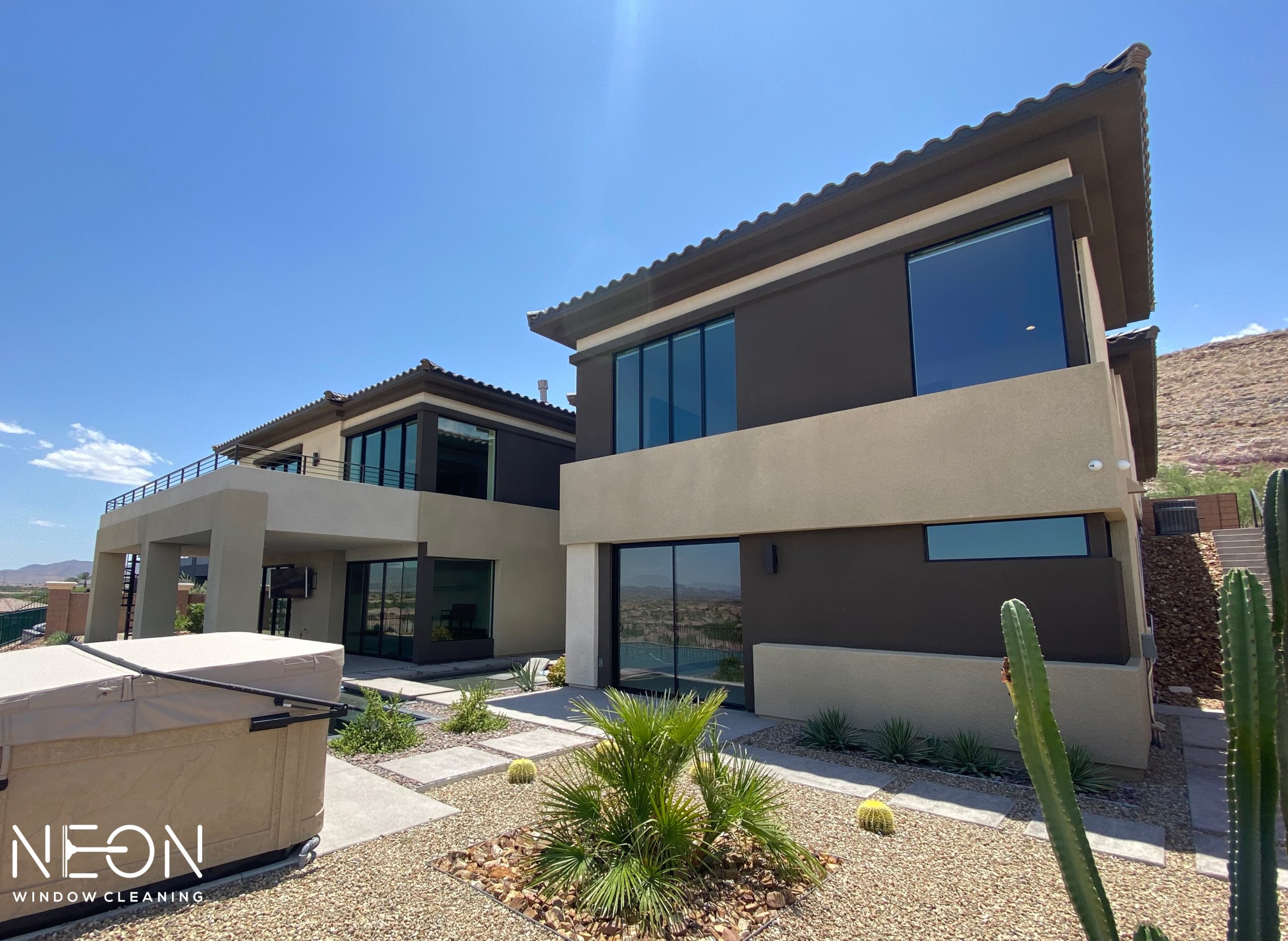 Luxury hillside home in Summerlin, NV with large windows and Red Rock canyon views