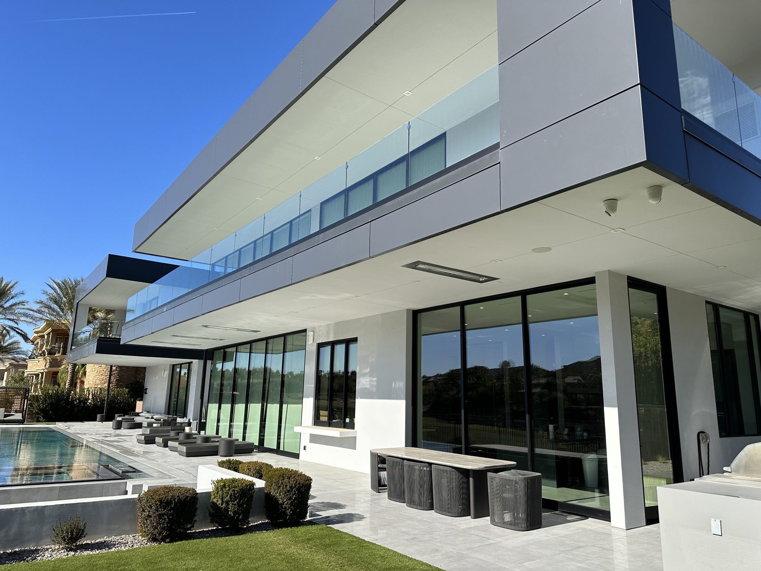 Luxury Henderson estate home with floor-to-ceiling glass professionally cleaned by Neon