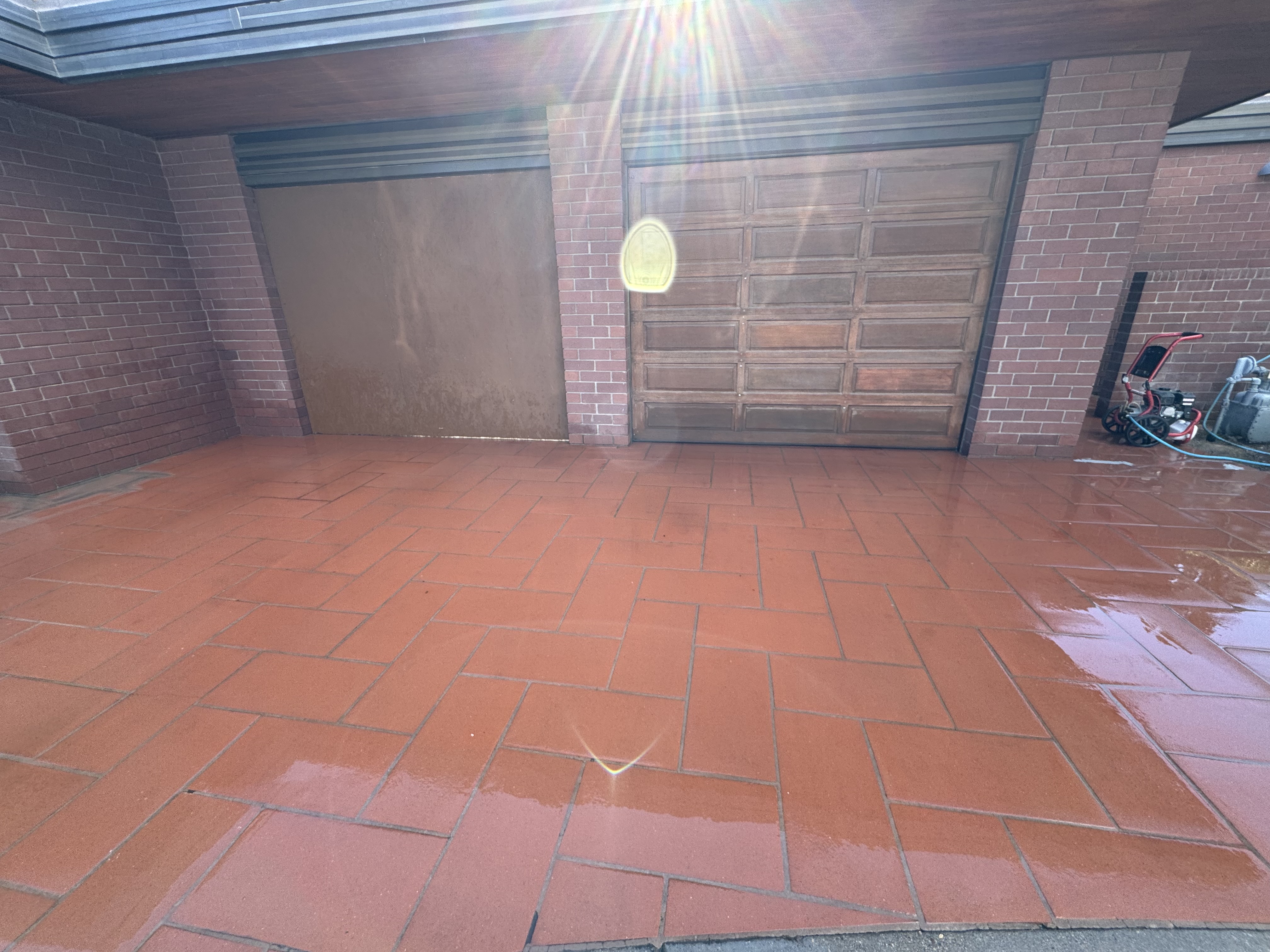 Same paved stone tile driveway fully restored to clean condition after professional pressure washing in Las Vegas